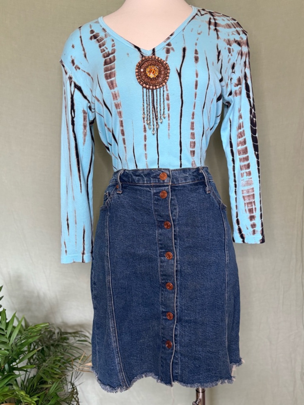 Light Blue Patterned V-Neck Top with Beaded Medallion